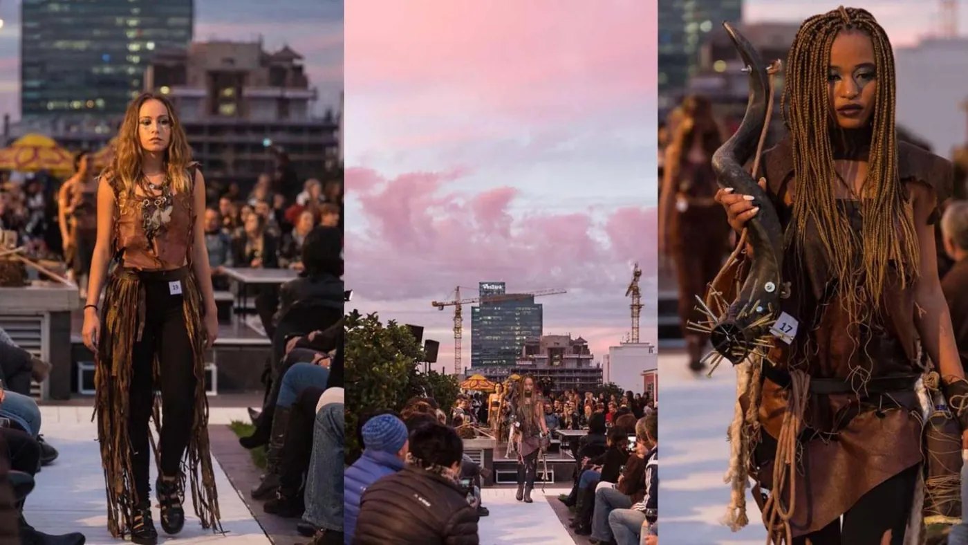 Models in Spelonk costume on a rooftop runway at dusk